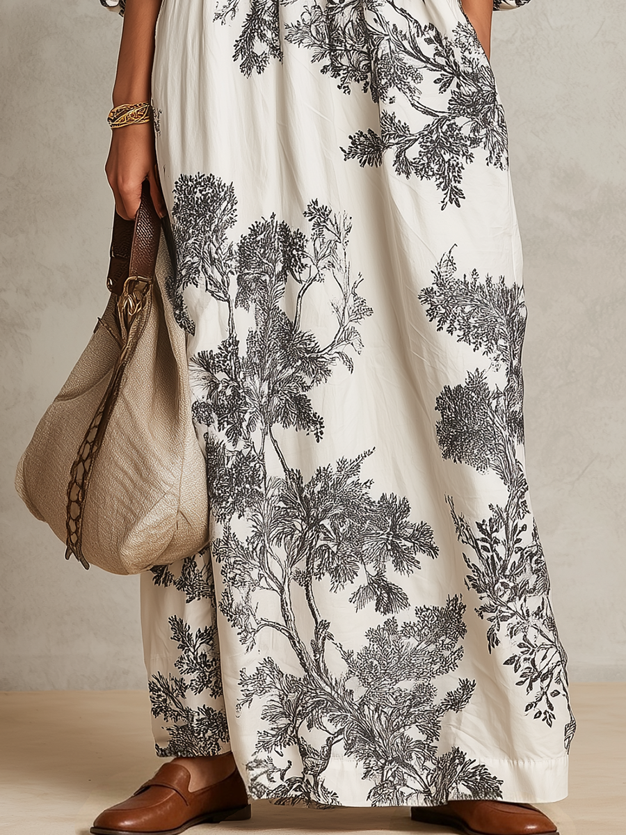 Elegant Ivory Botanical Print Maxi Dress