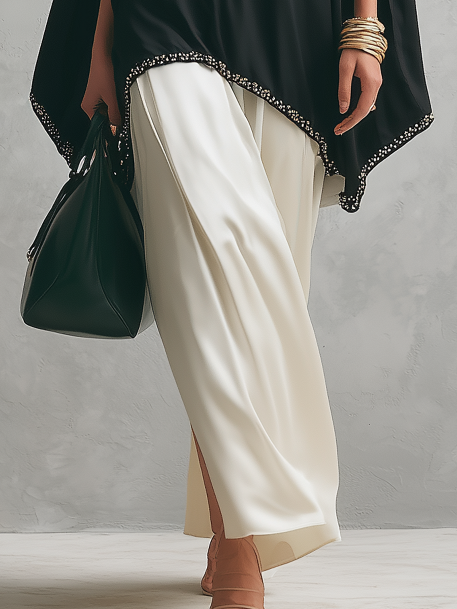 Minimal Black Cape-Style Top & Flowing Skirt Set